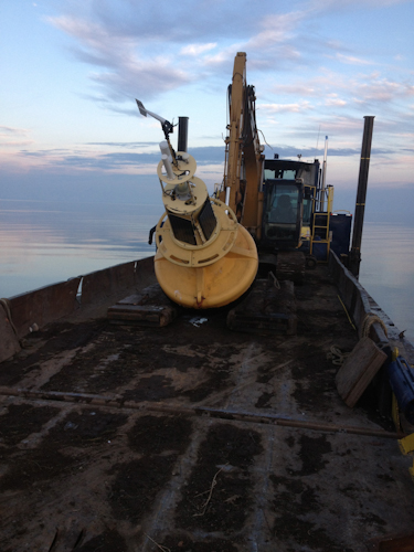 Barge Collecting Weather Buoy